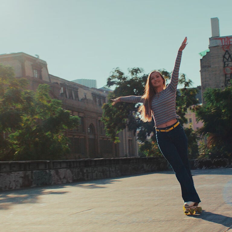 woman skateboarding | OtterBox